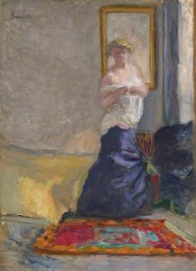 Jeune femme se déshabillant