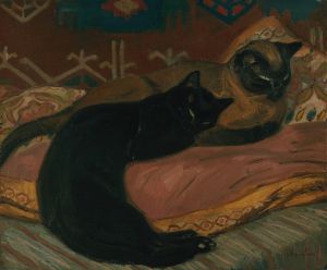 Deux chats couchés sur un canapé