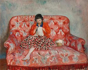 Jeune Fille Cousant Sur Un Canapé