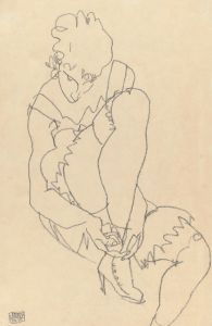Woman Buttoning Her Shoes