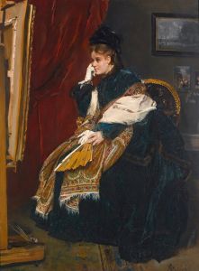 La femme en vert dans l’atelier