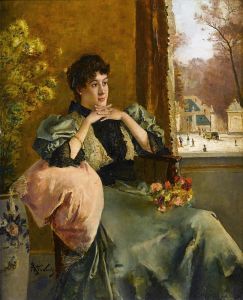 Femme pensive près d’une fenêtre