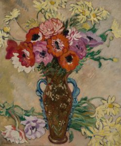Vase décoré aux anémones et marguerites jaunes de savane