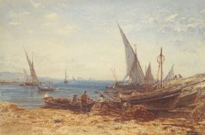 Fishermen and boats at water’s edge