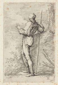 Soldier, Standing, Holding a Long Cane before a Rocky Wall