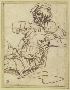 A man seated against a block on the right