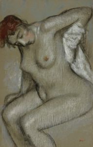 Femme nue s’essuyant