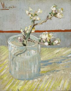 Sprig of flowering almond in a glass