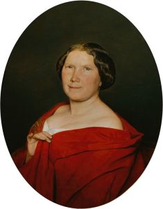 Frau mit lachsrotem Umhang