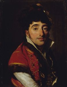 Portrait d’un acteur, en veste rouge bordée de fourrure