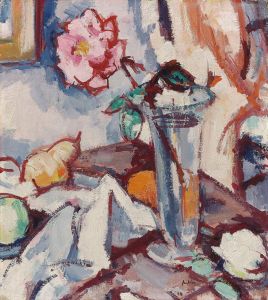 Pink rose in a glass vase with fruit