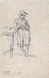 A Boy Leaning against a Table