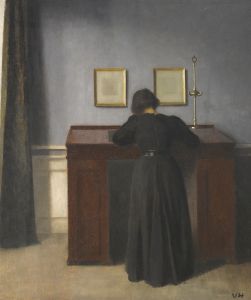 Ida Standing At A Desk