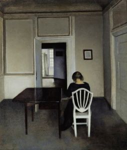 Interior With Ida in A White Chair
