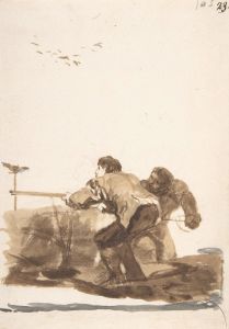 Men hunting birds using a decoy