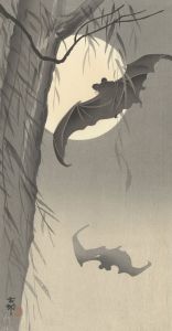 Two bats at full moon