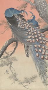 Two peacocks on tree branch