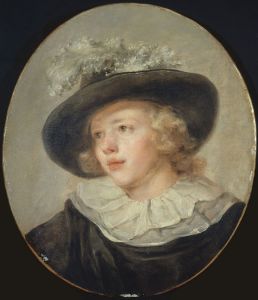 Portrait de jeune garçon avec un chapeau à plumes