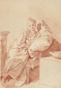 A young girl seated in an interior, leaning against a pillow